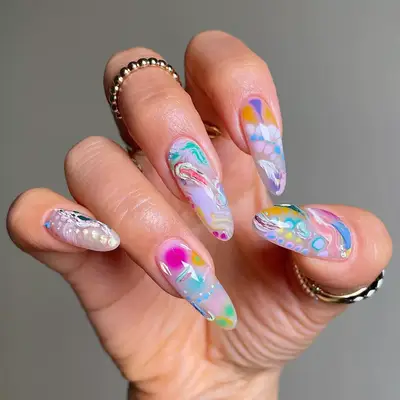Hand with abstract artistic nail design