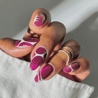 Short nails with peach-colored nail polish