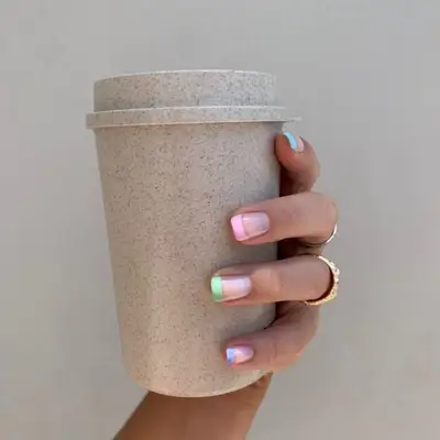 Pastel square French mani with blue, pink, green, and purple tips 