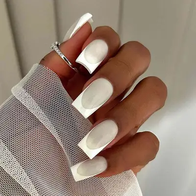 Monochrome white square French mani with opaque tips and a milky base