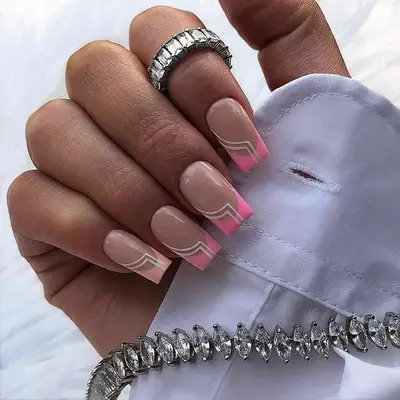 Pink square French manicure with white art deco-inspired details on each nail 