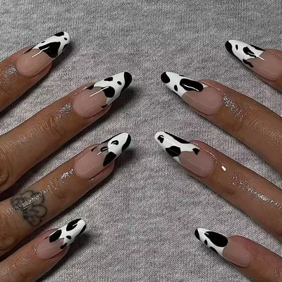 long nude nails with cow print tips