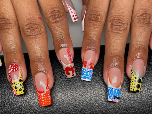 Yayoi Kusama-inspired nails with dots and bright colors