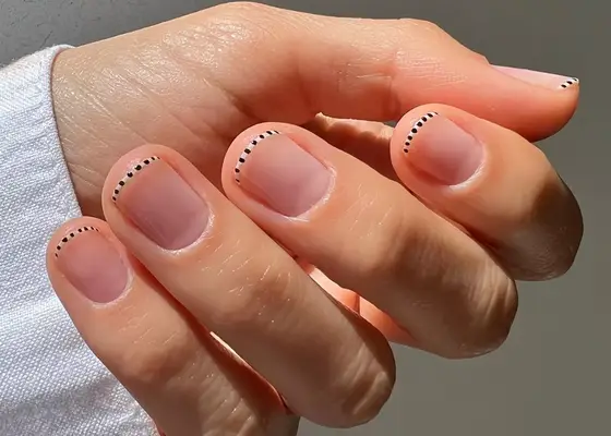 Black and white micro french manicure on short round nails 