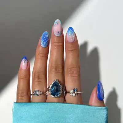 Wavy Blue Chrome Dragonfly Mani - MYM Beauty Chrome Nails for May 