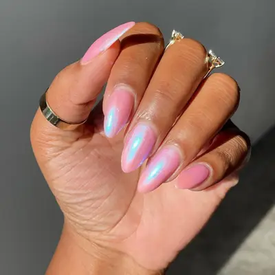 Blue-tinted chrome millennial pink manicure.