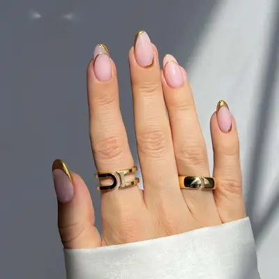 Gold chrome accent nails