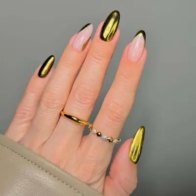 gold chrome accent nails