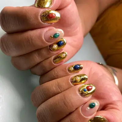 Gold chrome design nails