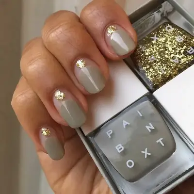 Khaki and Gold nails with sequined dots