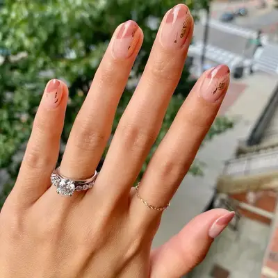 clear nails with Gold Foil Speckles on top