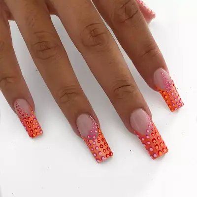 french manicure with peach dot design