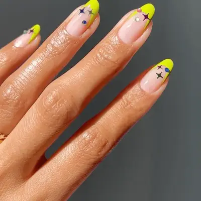 Yellow french nails with nail accents