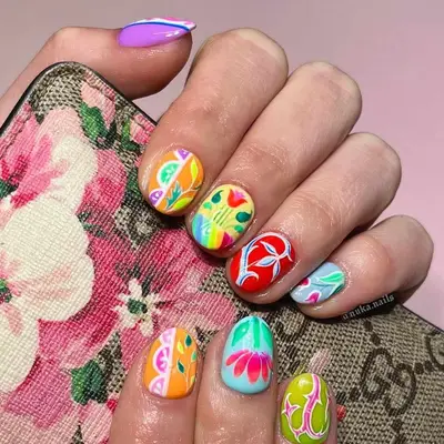 mismatched bold floral short nails