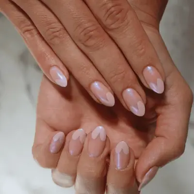French manicure with pink heart-shaped tips