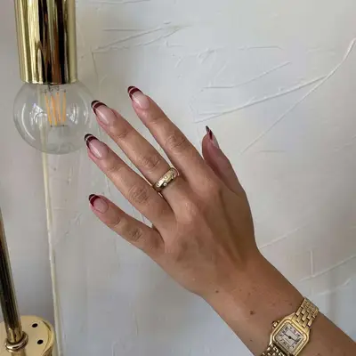 A double French manicure with mocha tips