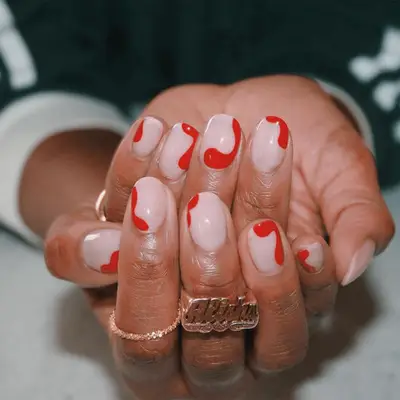 short red nails with abstract designs