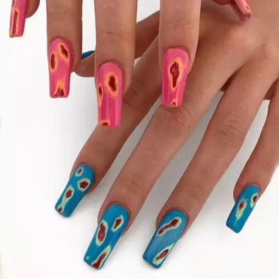 Burgundy Heat Map Nails with shades of pinks, blues, reds, and greens