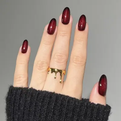 An oxblood manicure on squoval nails