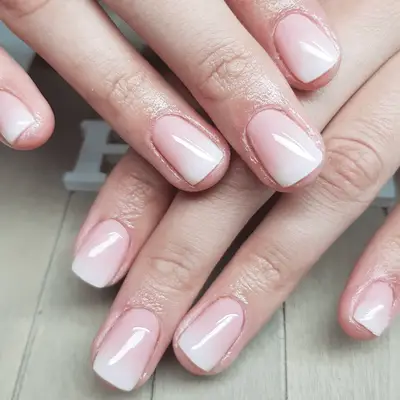 Short, square-shaped classic French ombre manicure