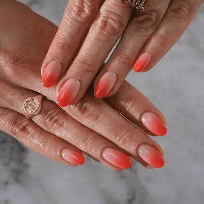 Pink and white French ombre manicure with diamond sparkle accent nails