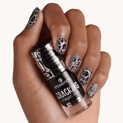 Model holding Essence Crackling nail polish