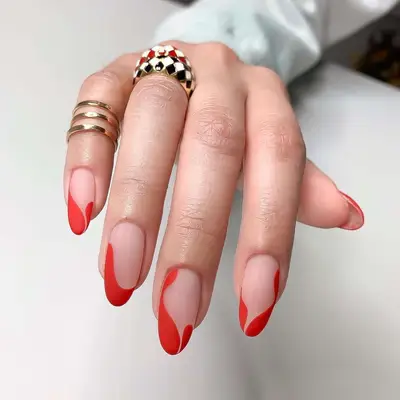 Matte tomato red swirl nails 