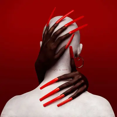 Extra long tomato red square nails wrapped around a mannequin head