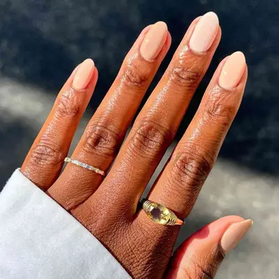 A milky nude manicure in gradient shades