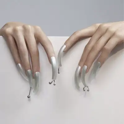 super long nails in pewter with piercings