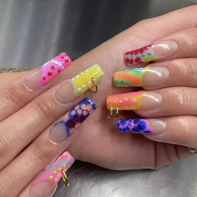 tie-dye mani with pierced nail