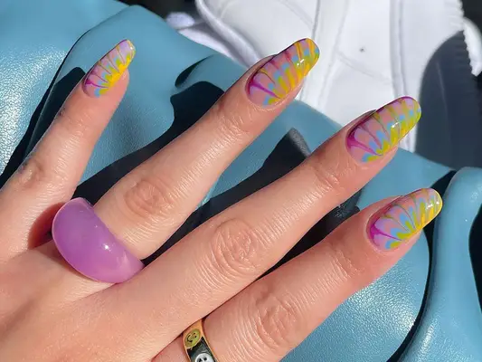 tie-dye nail art in cool tones