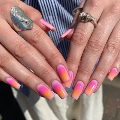 Hot pink and orange aura manicure