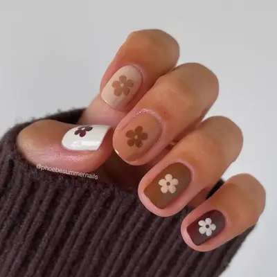 Mocha brown manicure with flower details