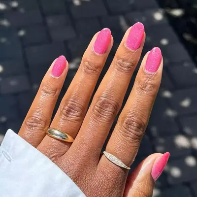 Short bright pink glitter nails
