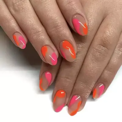 Pink and orange negative space nail design