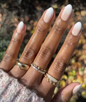 Almond-shaped nails with gradient french manicure