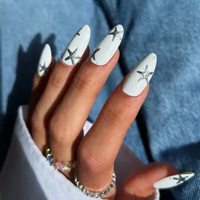 White matte long nails with silver star detailing