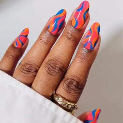 Pink, orange, and blue swirl nails