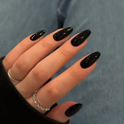 a super glossy black manicure