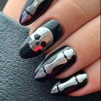 a manicure with bones and a skull
