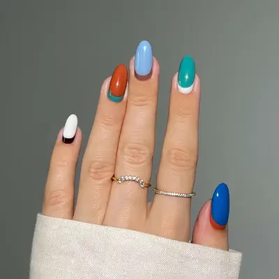 a reverse french manicure in solid neutral colors