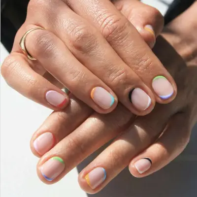 neutral nails with rainbow tips and bases