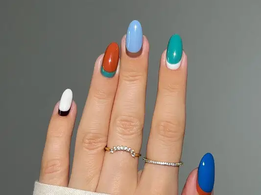 a colorful solid reverse french manicure
