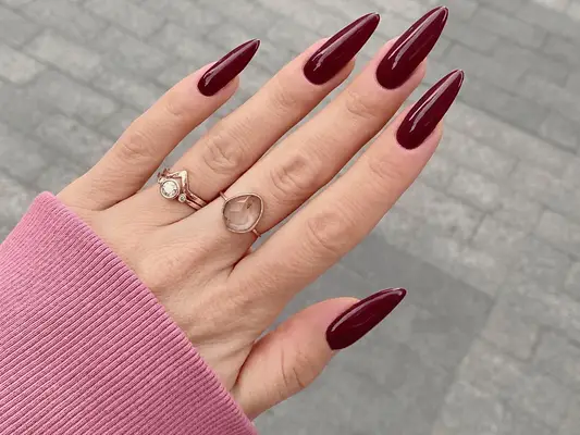 dark red long almond nails