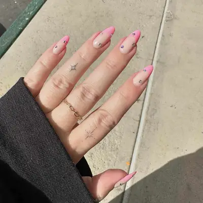 Pink tip French manicure with diamonds