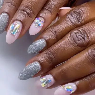 Holographic rhinestones and glitter nails