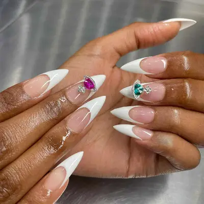 French tip stiletto nails with rhinestone accents