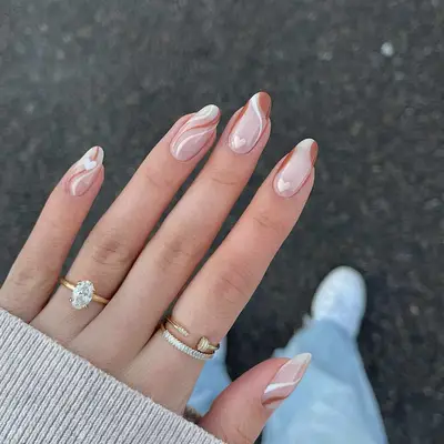 Close up of a twisty manicure with heart accents 