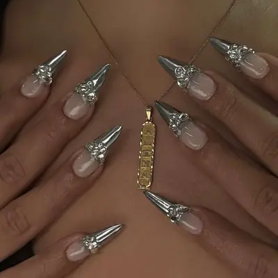 chrome french tips with rhinestone accents